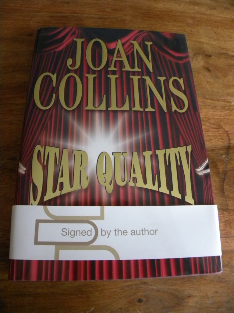 HI I HAVE FOR SALE OR POSSIBLE TRADE A BEAUTIFUL HAND SIGNED JOAN COLLINS